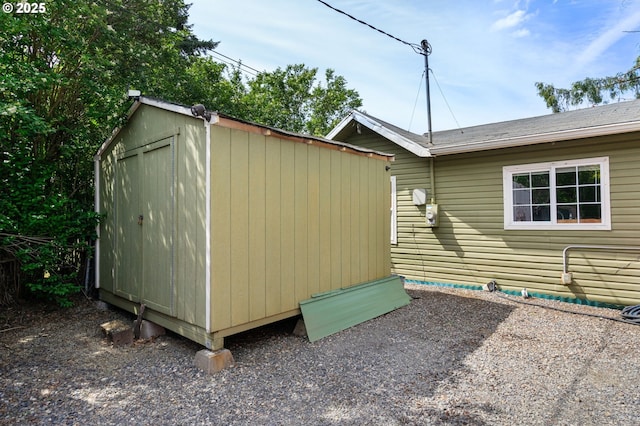 9819 SE Knight St, Portland, OR 97266 - view of property exterior featuring a storage shed