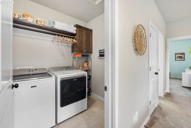 14665 Catalpa Way, Oregon City, OR 97045 - laundry area featuring cabinet space, washer and clothes dryer, and baseboards
