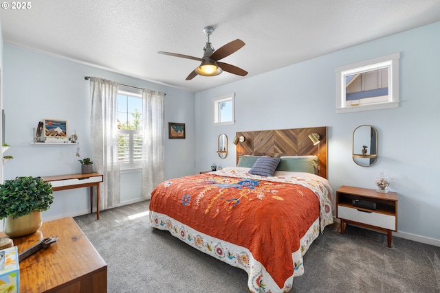 14665 Catalpa Way, Oregon City, OR 97045 - carpeted bedroom with a ceiling fan, baseboards, and a textured ceiling