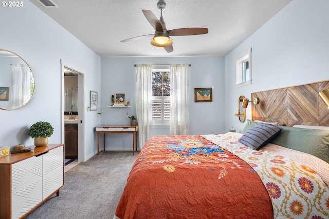 14665 Catalpa Way, Oregon City, OR 97045 - bedroom featuring light carpet, a sink, connected bathroom, ceiling fan, and a textured ceiling