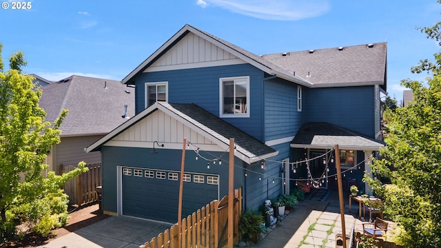 14665 Catalpa Way, Oregon City, OR 97045 - view of front of home featuring board and batten siding, a shingled roof, and concrete driveway