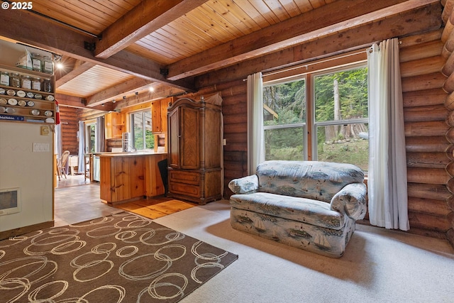 4347 S Schooner Creek Rd, Lincoln City, OR 97367 - sitting room with log walls and a wood ceiling with exposed beams