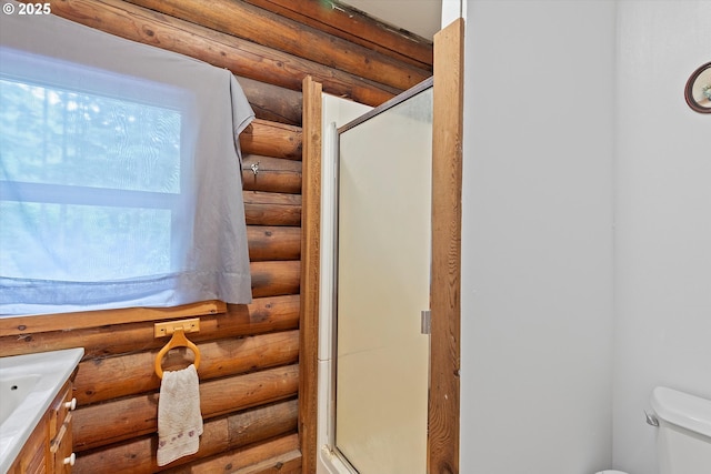 4347 S Schooner Creek Rd, Lincoln City, OR 97367 - bathroom with rustic walls, a stall shower, and vanity
