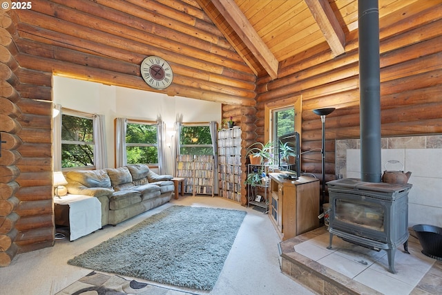 4347 S Schooner Creek Rd, Lincoln City, OR 97367 - living room with a wood stove, carpet flooring, a wooden ceiling with exposed beams, rustic walls, and high vaulted ceiling
