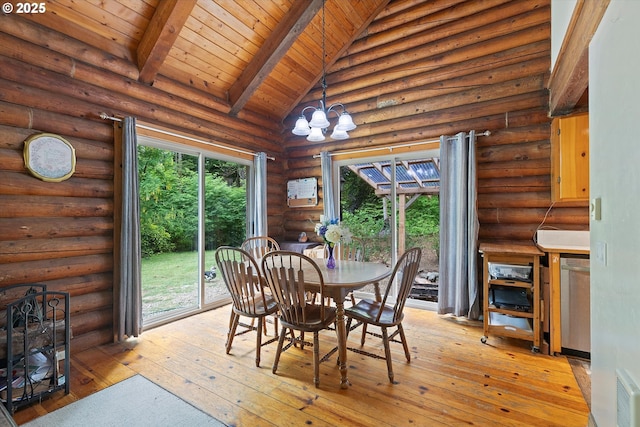 4347 S Schooner Creek Rd, Lincoln City, OR 97367 - dining space featuring a chandelier, light wood-type flooring, rustic walls, a wood ceiling with exposed beams, and high vaulted ceiling