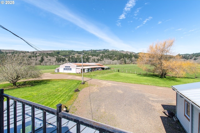 471 Barr Rd, Grays River, WA 98621 - view of front facade with a mountain view and a front yard