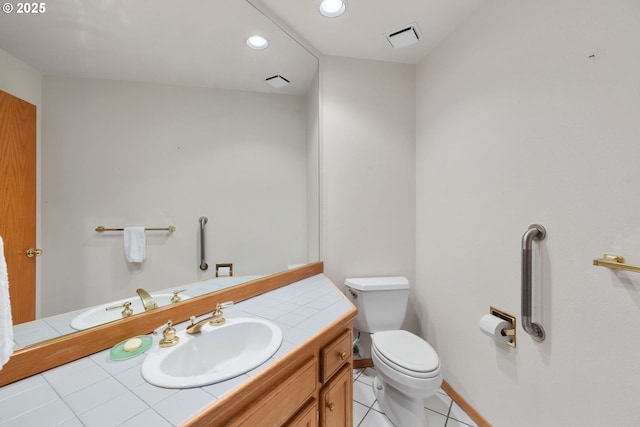 2305 Chickadee Ct, West Linn, OR 97068 - bathroom featuring toilet, vanity, tile patterned flooring, recessed lighting, and baseboards