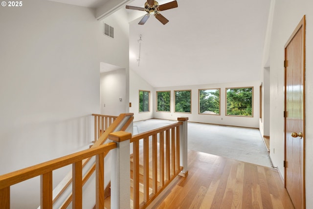 2305 Chickadee Ct, West Linn, OR 97068 - hall with an upstairs landing, healthy amount of natural light, light wood-style flooring, and baseboards