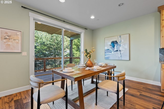 dining area with dark wood-style floors, recessed lighting, and baseboards