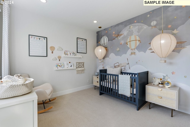 bedroom with a nursery area, recessed lighting, carpet flooring, and baseboards