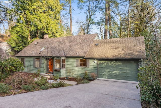 single story home featuring a garage