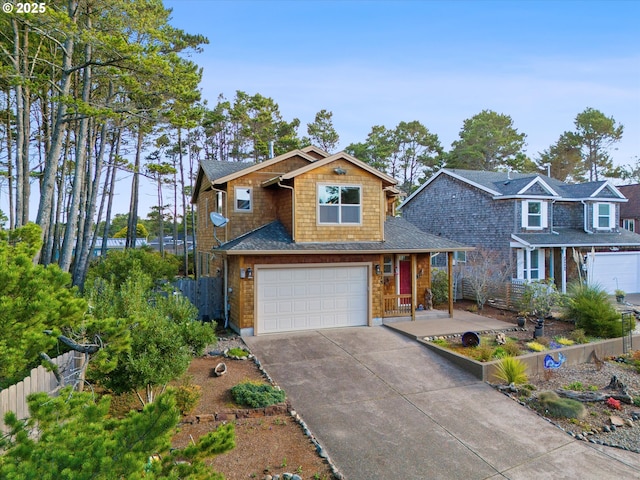 view of front facade with an attached garage, a shingled roof, driveway, and fence