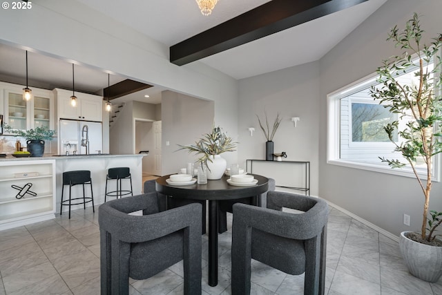 dining room featuring baseboards, recessed lighting, stairs, beamed ceiling, and marble finish floor