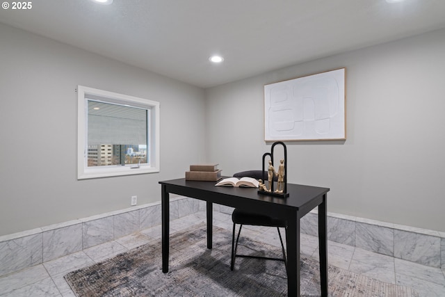 office with recessed lighting and marble finish floor