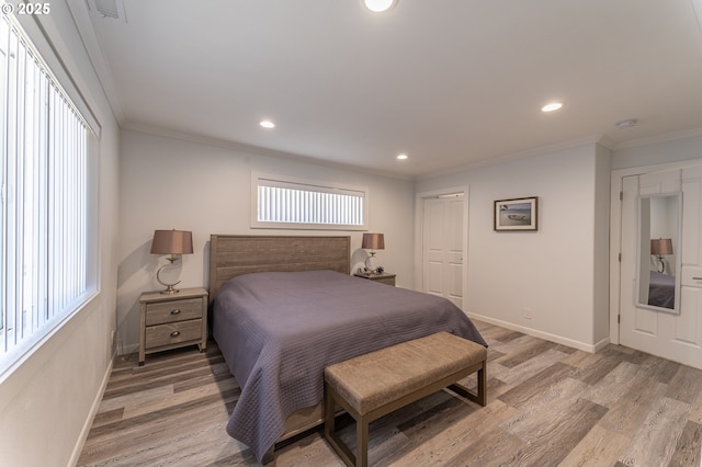 bedroom featuring light wood-style floors, recessed lighting, ornamental molding, and baseboards