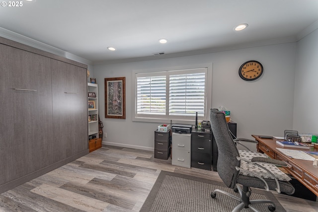 office area with crown molding, light wood finished floors, recessed lighting, and baseboards