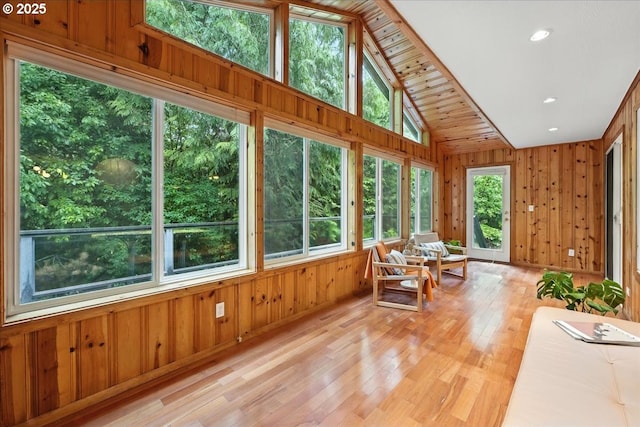 80487 Sha Ne Mah Rd, Seaside, OR 97138 - sunroom / solarium with wooden walls, vaulted ceiling, and wood finished floors