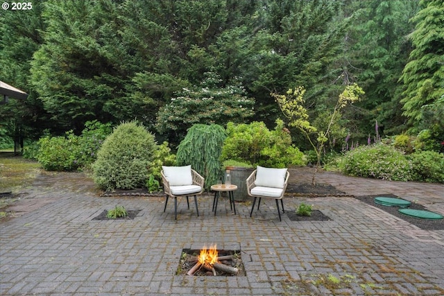 80487 Sha Ne Mah Rd, Seaside, OR 97138 - view of patio / terrace featuring an outdoor fire pit