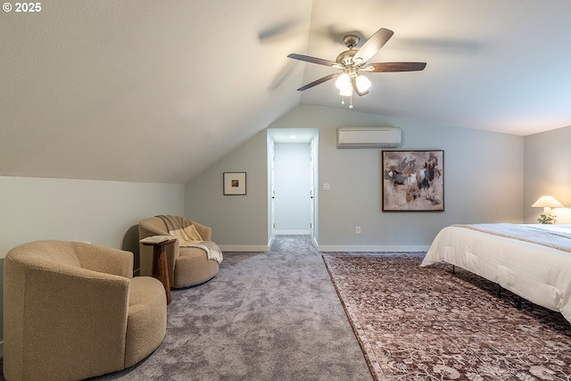 carpeted bedroom with ceiling fan, baseboards, vaulted ceiling, and a wall mounted AC
