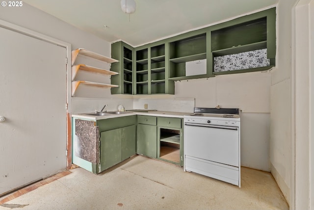 206 NE Laurel Ave, Myrtle Creek, OR 97457 - kitchen featuring green cabinetry, open shelves, electric range, a sink, and light countertops
