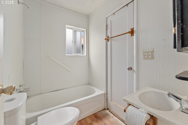 206 NE Laurel Ave, Myrtle Creek, OR 97457 - full bathroom featuring ornamental molding, wood finished floors, and bathing tub / shower combination
