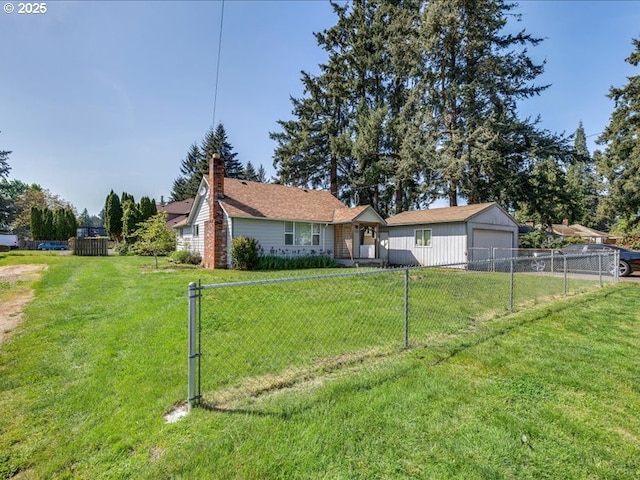 ranch-style house with fence, a detached garage, and a front yard