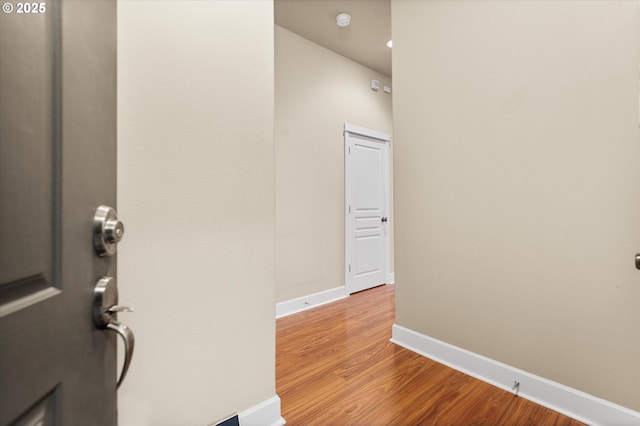 corridor featuring light hardwood / wood-style floors