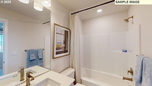 full bathroom with vanity, shower / bathtub combination with curtain, and toilet