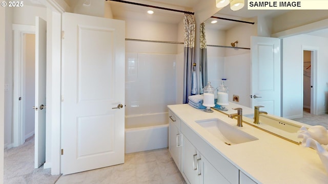 bathroom featuring vanity and shower / bath combo with shower curtain