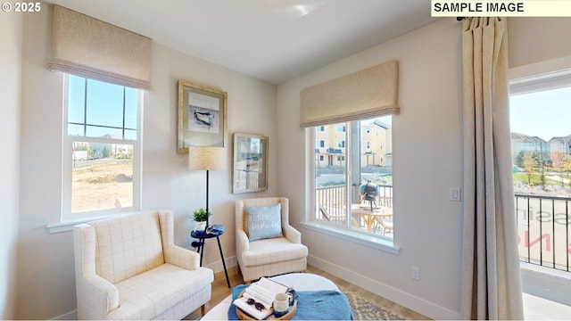 living area featuring plenty of natural light