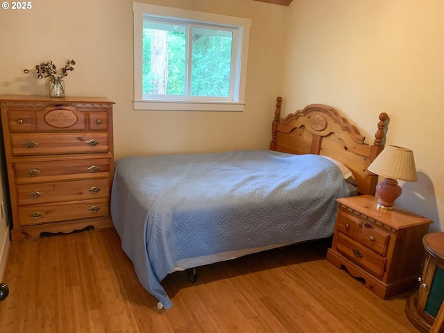 bedroom with light wood-type flooring