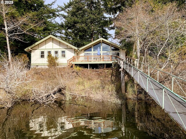 3140 S Tenmile, Lakeside, OR 97449 - rear view of property with a wooden deck and crawl space