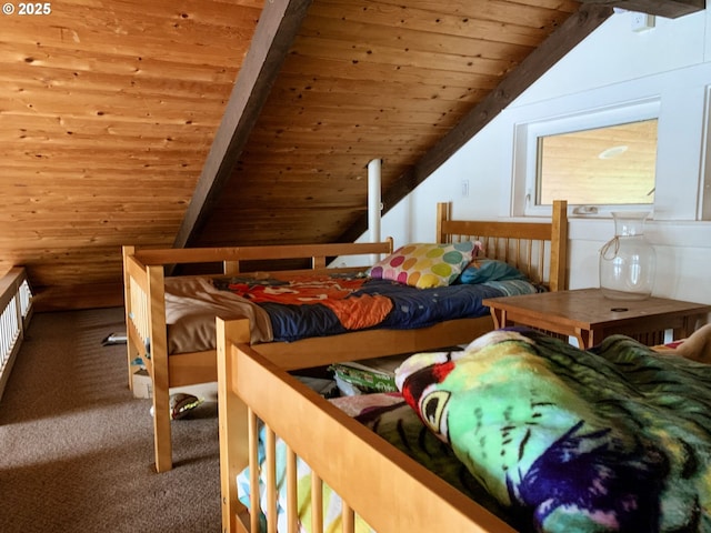 carpeted bedroom featuring vaulted ceiling with beams and wood ceiling