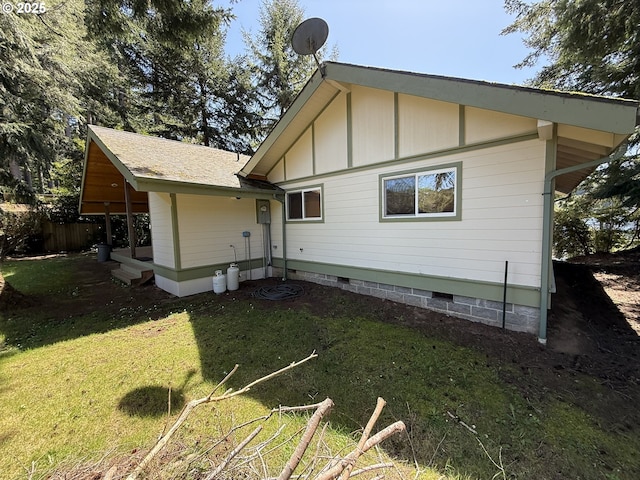 3140 S Tenmile, Lakeside, OR 97449 - back of house with crawl space, fence, and a yard