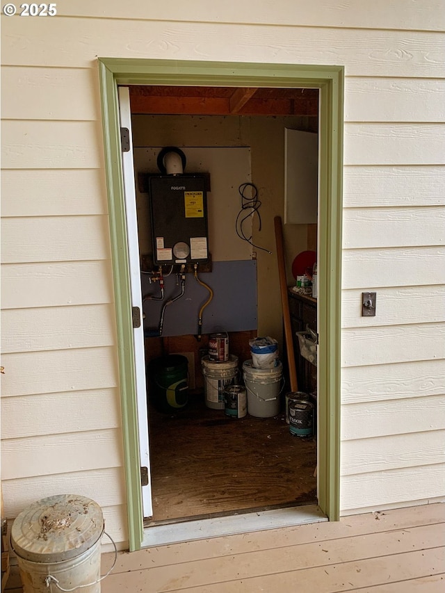 property entrance featuring water heater