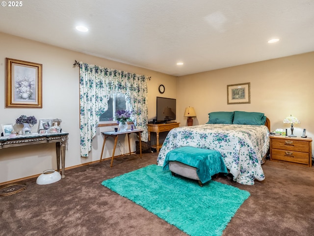 bedroom featuring dark carpet