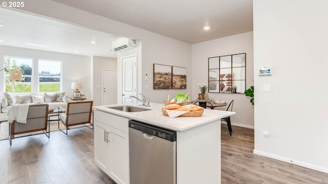 3505 SW Thomas Ave, Gresham, OR 97080 - kitchen with dishwasher, light wood-style floors, a wall mounted AC, white cabinets, and open floor plan