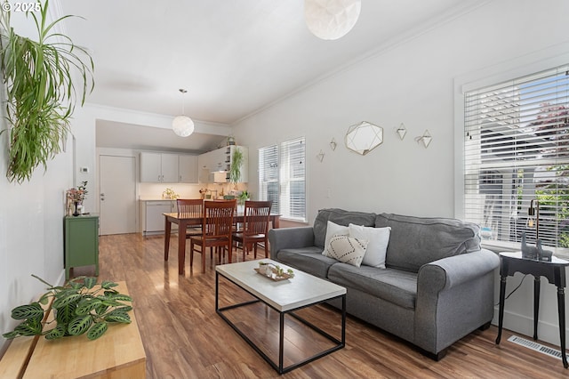 927 N Baldwin St, Portland, OR 97217 - living area featuring wood finished floors and ornamental molding