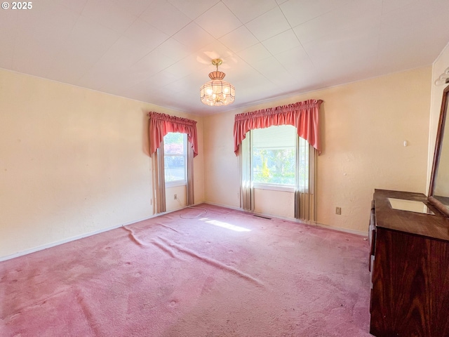 413 SW Brent Dr, John Day, OR 97845 - carpeted spare room with a chandelier