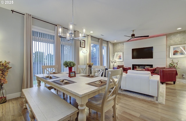 dining area featuring a healthy amount of sunlight and light wood-type flooring