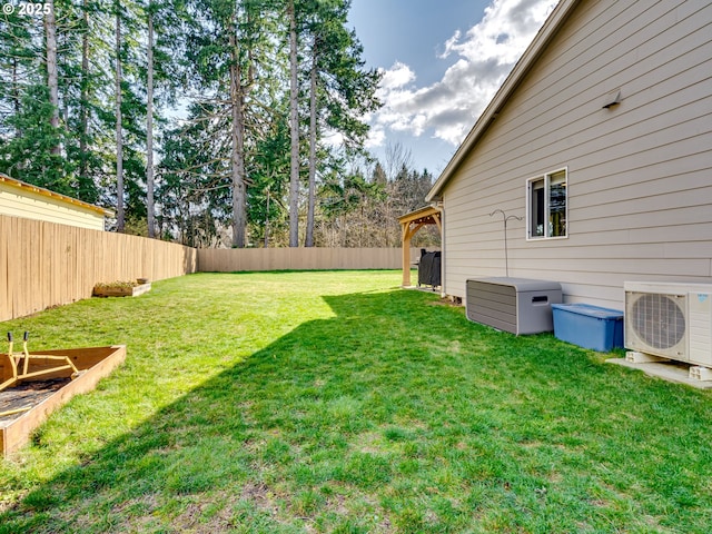 view of yard featuring ac unit and a fenced backyard