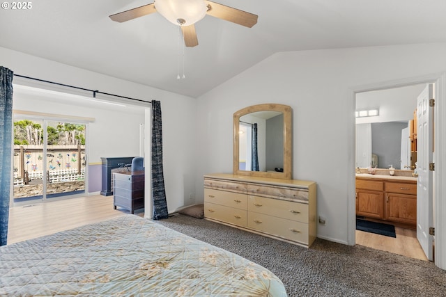 307 Cambridge Dr, Sutherlin, OR 97479 - carpeted bedroom with lofted ceiling, access to outside, ensuite bath, ceiling fan, and baseboards