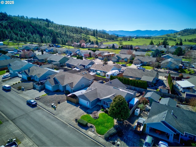 307 Cambridge Dr, Sutherlin, OR 97479 - aerial view of residential area with a mountainous background