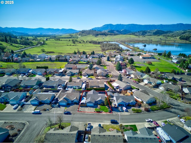 307 Cambridge Dr, Sutherlin, OR 97479 - aerial view of residential area with a water and mountain view