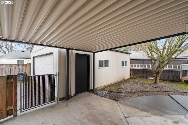 view of patio featuring a garage