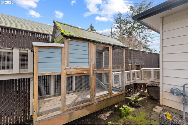 deck featuring an outbuilding