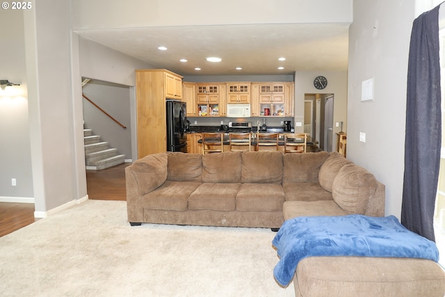 356 Wild Fern Dr, Winchester, OR 97495 - carpeted living room with stairs, recessed lighting, and baseboards