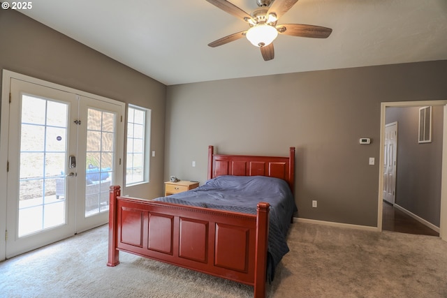 356 Wild Fern Dr, Winchester, OR 97495 - bedroom featuring light colored carpet, french doors, access to outside, baseboards, and ceiling fan