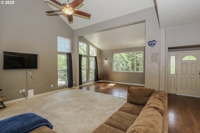 356 Wild Fern Dr, Winchester, OR 97495 - living room featuring ceiling fan, baseboards, wood finished floors, carpet floors, and high vaulted ceiling