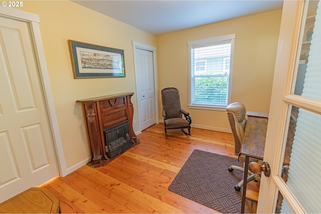 319 Kinnikinnick Way, Depoe Bay, OR 97341 - office area featuring light wood-type flooring and a fireplace